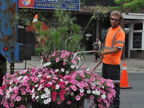 City employee Emil Booyink was hard at work watering the many flowers on Pitt Street, on Thursday July 2, 2020 in Cornwall, Ont.The Eastern Ontario Health Unit warned of another heatwave, starting on Wednesday and lasting for about three days. Francis Racine/Cornwall Standard-Freeholder/Postmedia Network