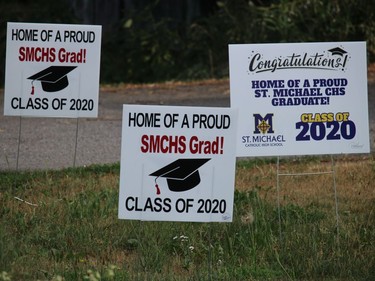 In Winchester Springs, several signs celebrating graduation from St. Michael school in Kemptville. Photo on Friday, July 3, 2020, in Winchester Springs, Ont. Todd Hambleton/Cornwall Standard-Freeholder/Postmedia Network