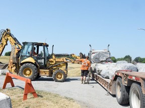 Workers from Gaucher Excavation installed several dozen large stones at entrance points around the periphery of the Morrisburg Waterfront Park July 10,2020. The stones, which were donated, were placed to control vehicle access to the park. 
Phillip Blancher/Morrisburg Leader