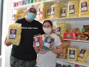 The Happy Popcorn Co. co-owner Bill Halman and niece/helper Elizabeth Garreffa were kept busy on Saturday July 25, 2020 in Cornwall, Ont, during The Big Spend, a country-wide initiative to encourage local businesses. Francis Racine/Cornwall Standard-Freeholder/Postmedia Network