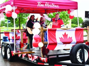 The Town of Devon held a different kind of Canada Day parade this year, driving multiple routes around town so that residents could watch from their homes. (Emily Jansen)