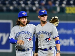 Blue Jays’ middle infield duo of shortstop Bo Bichette (left) and second baseman Cavan Biggio have played for a combined 11 minor-league teams the past three years.