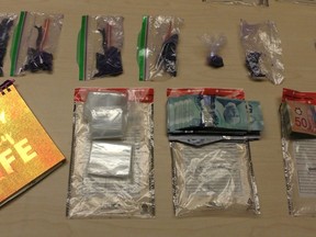 Purple fentanyl, packaging materials and cash were seized during a search of a Portsmouth District home in Kingston on June 26. (Supplied Photo)