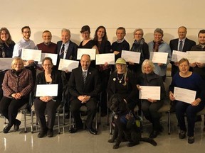 The 2020 heritage grant recipients, pictured with Kingston Mayor Bryan Paterson, centre, at the awards ceremony on Jan. 13, 2020, held at the Military Communications and Electronics Museum. (Jamie McKenzie-Naish/Supplied Photo)