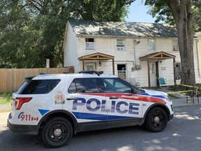 Kingston Police investigate a serious assault near the intersection of Division and Pine streets in Kingston, Ont., on Tuesday, July 28, 2020.
