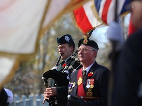 Princess of Wales' Own Regiment piper Tristan Perry plays at the Day of Remembrance ceremony at Cataraqui Cemetery on Nov. 8, 2019. The ceremony is cancelled for this November due to COVID-19 concerns. (Elliot Ferguson/The Whig-Standard)