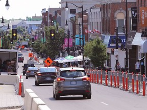 Princess Street was restored to allow two lanes of traffic on Monday after the LoveKingston Marketplace was re-evaluated. (Ian MacAlpine/The Whig-Standard)