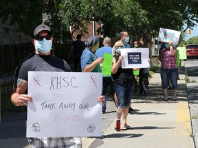 Unionized at Kingston Health Sciences Centre's Hotel Dieu Hospital site on Brock Street as well as Kingston General Hospital staff conducted a noon-hour information picket on July 17 regarding Bill 195. (Ian MacAlpine/The Whig-Standard)