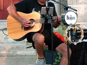 Tom Buchanan, Beatles tribute artists, performed in a front yard concert on July 24 to raise funds for the Gananoque Food Bank.  
Supplied by Tom Buchanan