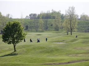Golfers enjoy an exceptional spring day at River Road Golf Course in London, Ont. on Wednesday May 16, 2018. (Derek Ruttan/The London Free Press)