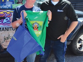 Photo by KEVIN McSHEFFREY/THE STANDARD
Elliot Lake’s Kristie Pinard received a gift bag from Moose FM radio personality Aaron Ferguson. The bag contained a T-shirt and a gift card. Ferguson operates the Moose’s Kindness Cruiser giving gift bags to people who have been nominated for doing an act of kindness.