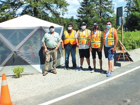 Photo by Leslie Knibbs/
For The Mid-North MonitorWorking the checkpoint in Sagamok are: Chief Nelson Toulouse, Mitchel Eshkakogan, Maxwell Abitong, Clinton Manitowabi and supervisor Orion Southwind.