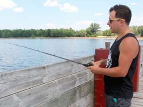 Kasey Hellawell tries his luck from the Government Dock in North Bay, Wednesday. He started the Facebook group North Bay Fishing Club several months ago, and now has close to 700 members looking for and offering advice on fishing in the area.
PJ Wilson/The Nugget