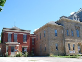 The city-owned former courthouse and jail property on 3rd Avenue East in Owen Sound seen on Tuesday. The two-storey governor's residence can be seen to the left of the old courthouse, while the jail buildings are behind the two structures. 
DENIS LANGLOIS/The Sun Times