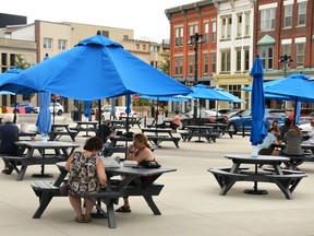 The City of Stratford has installed new, larger umbrellas to create more shade for diners using Stratford's Al Fresco tables in Market Square. Larger umbrellas will also be installed at the tables at Memorial Gardens and Tom Patterson Island. Galen Simmons/The Beacon Herald/Postmedia Network