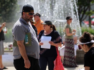 Event co-organizer John Sawczuk speaks with participants during a protest against Sarnia's mandatory mask bylaw on Thursday July 30, 2020 in Sarnia, Ont. Terry Bridge/Sarnia Observer/Postmedia Network