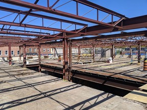 The roof and walls of the former Norfolk Inn building have been removed as part of Indwell's construction process to turn it into Dogwood Suites, an affordable housing complex with 32 apartments. This is the top floor of the building in downtown Simcoe. (CONTRIBUTED
