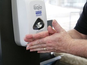 Hand-sanitizing stations have been installed at various locations at Tom Davies Square in Sudbury, Ont. to combat the COVID-19 virus. The pandemic continues to play havoc with the city's finance.