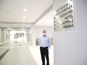 Robert Green, property manager of Elm Place, formerly known as the Rainbow Centre in Sudbury, Ont., shows off a new corridor of the facility that leads to the bus station at Elm Street.