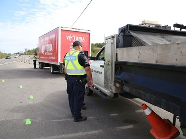 Greater Sudbury Police and the Ontario Ministry of Transportation participated in a commercial motor vehicle blitz on MR 80 in Greater Sudbury, Ont. on Friday July 17, 2020. Officers pulled over large and small commercial vehicles addressing aggressive driving, speeding, unsafe loads and documentation. John Lappa/Sudbury Star/Postmedia Network