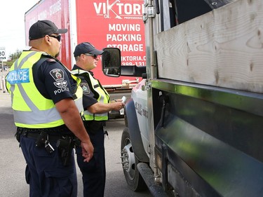 Greater Sudbury Police and the Ontario Ministry of Transportation participated in a commercial motor vehicle blitz on MR 80 in Greater Sudbury, Ont. on Friday July 17, 2020. Officers pulled over large and small commercial vehicles addressing aggressive driving, speeding, unsafe loads and documentation. John Lappa/Sudbury Star/Postmedia Network