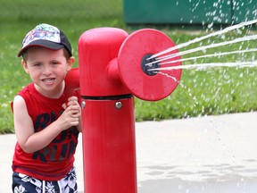 Caleb Deschamps, 3, plays at the splash pad at the Howard Armstrong Recreation Centre in Hanmer, Ont. on Tuesday July 21, 2020. A new splash pad has opened in New Sudbury.