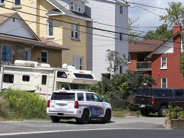 Greater Sudbury Police surrounded an apartment building on Beatty Street in Sudbury, Ont. on Thursday July 30, 2020. According to a tweet by police, just before 4:30 p.m. Thursday, tactical and K9 police officers entered a unit in the apartment building and took a 38-year-old man into custody. He is charged with numerous offences including robbery with a firearm, aggravated assault, break and enter and uttering death threats. He will attend bail court Friday. John Lappa/Sudbury Star/Postmedia Network