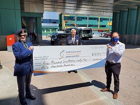 Marjorie Thibault (left), Ladies' Auxiliary Zone H-3 commander, and Len Leclair, president of the Royal Canadian Legion Branch 76, presents a $4,762 cheque to Anthony Keating, president and CDO Foundations and Volunteer Groups at Health Sciences North. The money will be used to purchase an anesthesia cart for the magnetic resonance imaging suite at HSN. Supplied