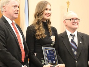 Amber Harding receiving her City of Sarnia Accessibility Award from Sarnia Mayor Mike Bradley and Coun. Terry Burrell in 2019. The Sarnia Accessibility Advisory Committee is looking for nominees – businesses and individuals – who have helped make the city more accessible for the 2020 iteration of the awards. (File photo/Postmedia Network)