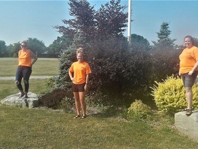 Captain Kidd Days organizing committee members (left to right) Ashley Robbins, Devin Galvin and Marianne Gignac stand at the Corunna Athletic Park. Captain Kidd Days will take place virtually on Aug. 1, with a bottle and food drive held in the morning and livestream entertainment in the evening. Carl Hnatyshyn/Sarnia This Week