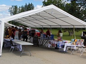 This photo taken in July 2019, shows the Mountjoy Farmers' Market operating under a mobile shelter set up in the Participark. The market kicks off for a new season beginning this Saturday.

The Daily Press file photo
