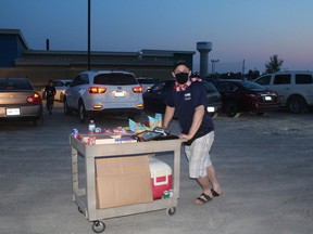 Jean Brisson of the Empire Theatre walked around with a concession stand to provide goodies for the movie goers. .TP.JPG
