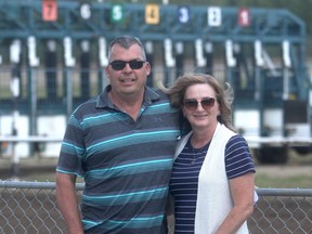Left to right: Norm and Natalie Tremblay in-between races at Evergreen Park on Sunday afternoon. The horse owners are part of two groups—one Alberta based and one U.S. based—but still remain valuable members of the Evergreen Park horse-racing community.