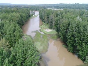 Holes from the front nine of the Whitecourt Golf & Country Club were hard hit by recent floods. 
Aerial photo by Layne Brown