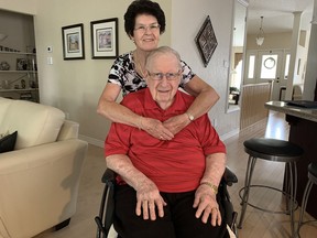 Leny and Ron Hardman, a retired Brant OPP officer, in their Brantford home. Just over 50 years ago, while on duty, he was hurt in a car crash that left five people dead, including his partner Const. Stefan Schultz.