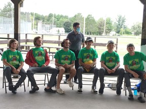 The six teenagers who form the paddling fundraising team Canoe4Covid were greeted
by the Espanola Community when they arrived at the Red McCarthy Ball Fields. Shown are Will
Vyse, Cailan Robinson, Tim Mulligan, Jacob Heisey, Georges Kirijian and Nolan Aziz, along
with Espanola Helping Hand Food Bank volunteer Peter. (Photo Supplied)