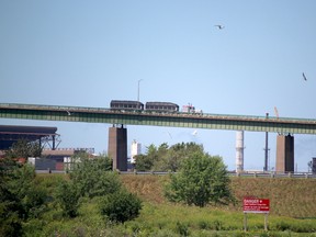 Northbound transport on the International Bridge. Algoma Steel is in the background on Thursday, July 30, 2020. (BRIAN KELLY/THE SAULT STAR/POSTMEDIA NETWORK)