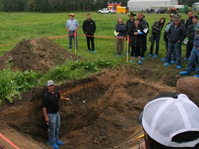Daryl Chubb in the soil pit explaining how soil chemistry changes as you go deeper, how it affects plants and how to assess your soil health at the Peace Country Beef and Forage Association Ag Field Day at the Fairview Ag Research Farm on Aug. 1, 2019.