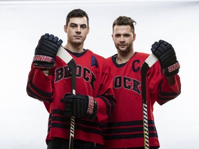 Jeff Corbett, left, and Brody Silk played together for nine years, first with the Sudbury Wolves of the OHL, then the Brock Badgers of the OUA, before joining different professional teams in France this past season.