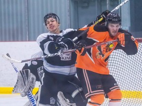 Grant Yee of the County of Grande Prairie Kings gets tied up with Eric Dentinger of the Fairview Flyers during a North West Junior Hockey League game at the Crosslink County Sportsplex back in February. The NWJHL recently held a league-wide meeting with a Jr. B rep from Hockey Alberta. More questions than answers came from the Zoom meeting on July 21.