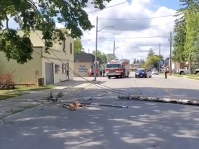 A collision on Western Avenue in Delhi on Wednesday morning led to a hydro pole falling into the roadway. (OPP photo)