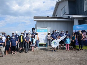 Habitat for Humanity and its partners celebrate the ongoing construction of four duplexes in the Northridge neighbourhood of Grande Prairie, Alta. on Thursday, Aug. 6, 2020.