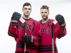 Jeff Corbett, left, and Brody Silk played together for nine years, first with the Sudbury Wolves of the OHL, then the Brock Badgers of the OUA, before joining different professional teams in France this past season. BROCK ATHLETICS PHOTO