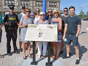 The Burrows family, including Elaine Burrows, centre, was on hand Friday for the unveiling of a plaque declaring Jack Burrows Place outside North Bay Museum in honour of the former mayor.

Supplied Photo