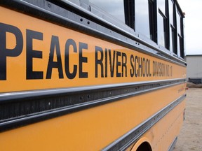 A bus is parked at the Peace River School Division's Central Operations building in Grimshaw, Alta. on Saturday, April 25, 2020. PRSD will continue to bus HFCRD students in the 2020/2021 school year.