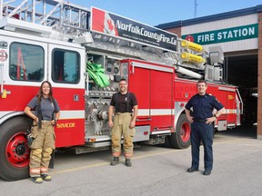 The Norfolk County Fire Department is looking for 22 individuals able to fill volunteer positions across the community. Marcia VanHaverbeke and Doug Rixmann, both volunteers at the Simcoe location, stand with Deputy Chief Scott Pipe at the fire station on Culver Street. Ashley Taylor/Postmedia Network