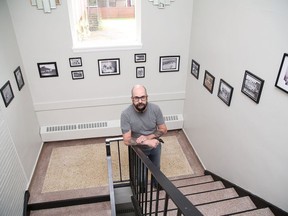 Peter Mihaichuk, of BRB Studio in Coniston, Ont., stands in a stairwell featuring historical photos of the area. BRB Studio, located at the former Club Allegri, is a 10,000 square-foot multipurpose production facility dedicated to photography and the motion picture arts. JOHN LAPPA/SUDBURY STAR