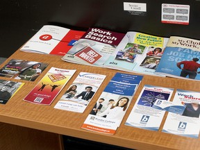 A number of pamphlets on finding a new career path sit on a table at the JUST Transition Centre in the building that also houses the Keephills Public Library. The facility, designed to help laid off or fired coal workers find a new path due to the phase-out, opened last month in Parkland County.