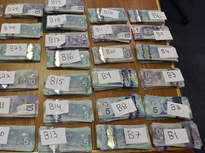 More than $18,000 in Canadian cash was seized. (SUPPLIED PHOTO)
