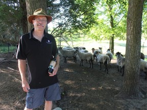 Marc Alton holds a bottle of Sheep Wine, the latest offering from Alton Farms Estate Winery near Aberarder.